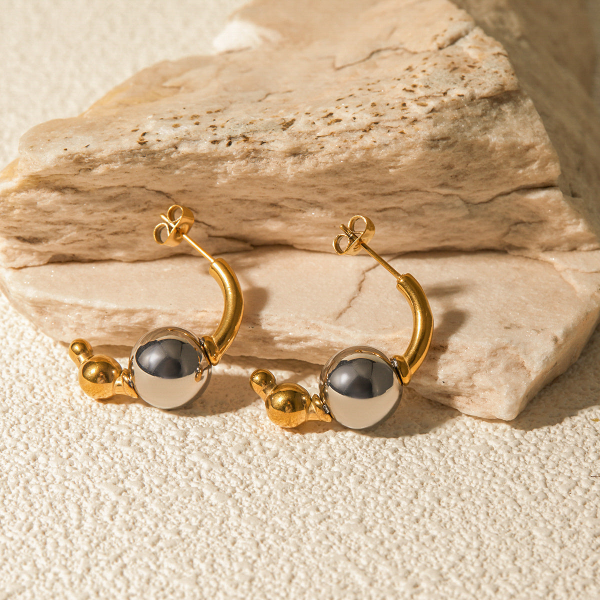 Fashionable Gold And Silver Earrings